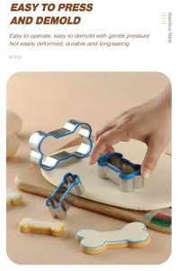 Stainless steel dog bone cookie cutter set with blue edge for DIY baking and pastry making.