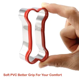 Stainless steel dog bone cookie cutter with soft red PVC grip for easy DIY baking enjoyment.