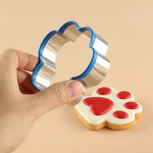 Stainless steel paw print cookie cutter for baking dog biscuits, pastries, and cute desserts.