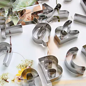 Large 26-letter stainless steel cookie cutter set for baking cookies and fondant.