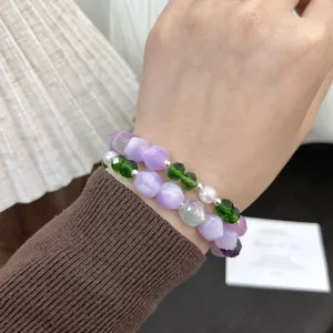 Double layer handmade beaded bracelet with purple gradient and green crystal beads for DIY.