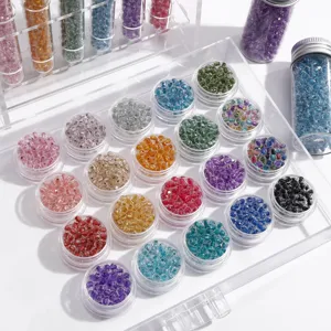 Colorful glass seed beads in storage containers for DIY bracelet necklace making supplies