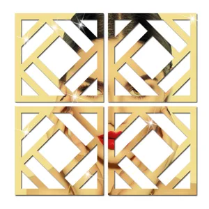 Close-up of gold geometric acrylic mirror wall sticker detail with hollow square design.