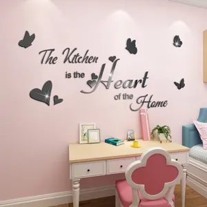 Detailed scene view of acrylic mirror wall sticker featuring quote and butterflies for home kitchen decor.