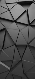 Detailed close-up of dark gray 3d geometric triangle pattern sticker surface texture.