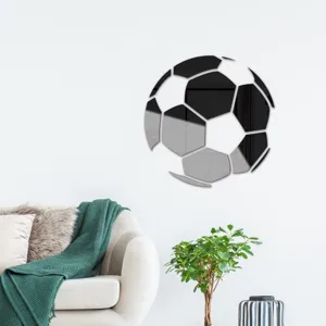 Detail view of the mirror acrylic soccer ball wall sticker showcased in a modern living space.
