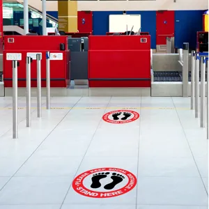 Social distance floor sticker for airport queue control and safety warning sign details.