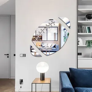 Close-up view of football acrylic mirror wall sticker in modern living room decor detail.