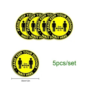 Yellow black social distancing floor warning stickers, 30cm round 5pcs set for safety.