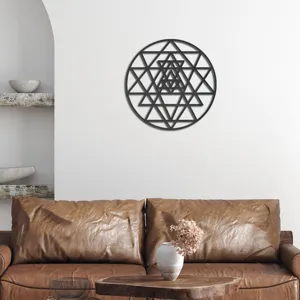 Detailed view of black geometric wall sticker in modern living room setting, elegant decor art.