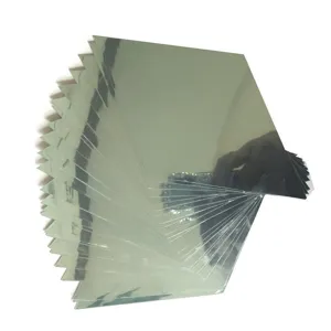 Detail shot showing the fanned-out square PET mirror stickers, flexible self-adhesive wall decor.