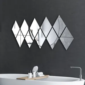 Close-up of diamond acrylic wall mirror stickers, flexible DIY decor for bathroom interior.