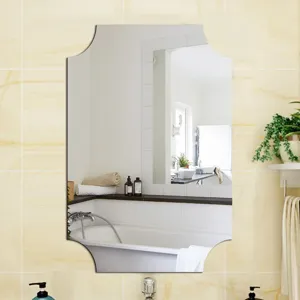 Decorative wall mirror with unique scalloped edge design for modern bathroom and home decor.