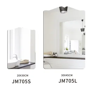 Decorative wall mirror detail view showing clean reflective surface and elegant shape design.