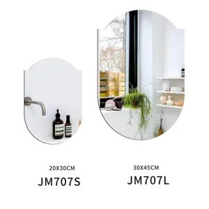 Decorative oval mirror wall sticker for bathroom and home decor, available in two sizes.