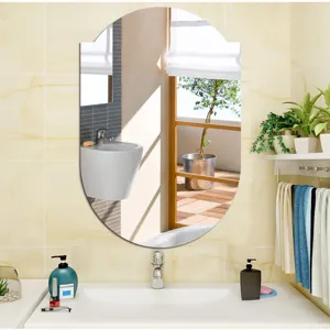 Decorative oval wall mirror sticker for bathroom, modern style home decor detail view.