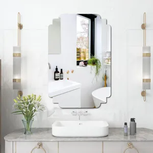 Scalloped decorative wall mirror for bathroom vanity, modern frameless hanging mirror detail.
