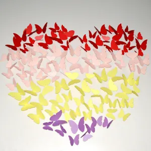 3D pearlescent paper butterfly wall sticker, colorful DIY decor detail, wedding party background.