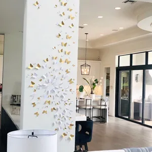 Stunning 3D pearlescent paper butterfly wall stickers detail view in modern luxury home interior.