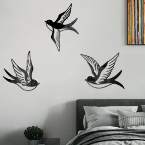 Acrylic mirror bird wall stickers detail showing 3 flying swallows on bedroom wall decor.