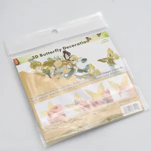 Detailed view of 3D gold butterfly wall sticker packaging, beautiful home decor item.