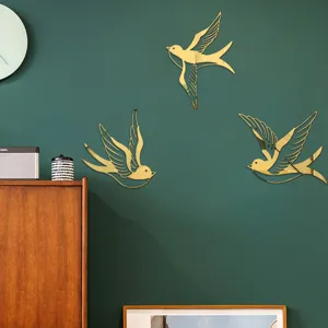 Acrylic mirror bird wall sticker set, modern 3D flying swallow home decor for living room.