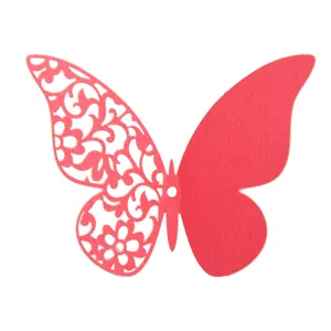 Close-up detail of pink 3d hollow butterfly wall sticker, pearlescent paper craft decor.