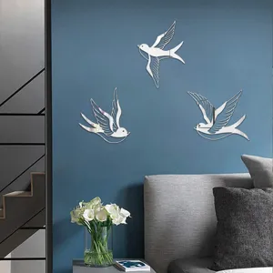 Acrylic mirror wall stickers featuring flying birds design for modern living room decor.