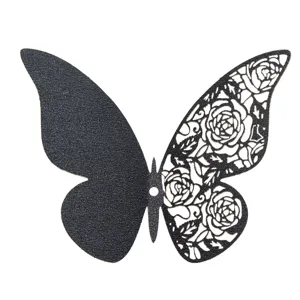 Detailed view of the hollow rose pattern butterfly wall sticker, elegant black finish.