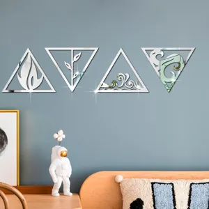 Detail view of 3D acrylic mirror wall stickers, four elements triangle design for home decor.