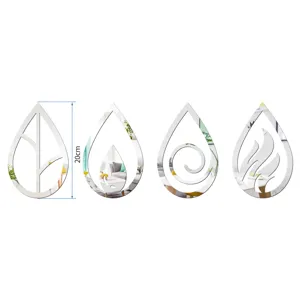 Detailed view of 3D acrylic mirror wall stickers, showing elements designs like leaves and flames.