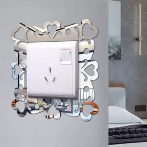 Acrylic mirror switch sticker with heart cutout design, perfect for home wall decor.