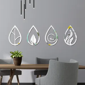 Detailed scene view of decorative acrylic wall mirror stickers displayed in modern dining room.