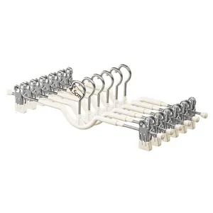 Household seamless pant hangers with anti-slip clips for wardrobe skirt and trousers storage.