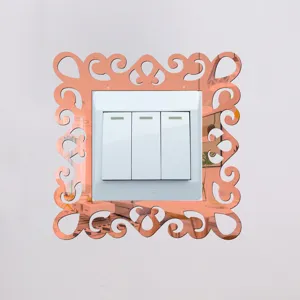 Acrylic mirror switch sticker, ornate hollow carved design, decorative wall plate surround.