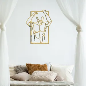 Detailed view of the gold acrylic mirror wall sticker featuring abstract body art for home decor.