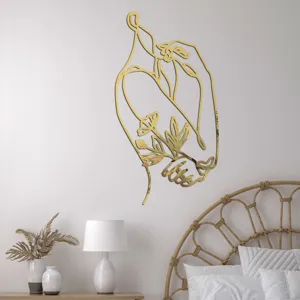 Artistic acrylic wall sticker detail featuring a gold mirror line art design of figure and floral.