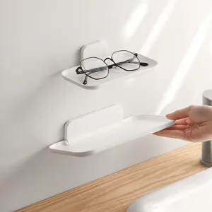 Wall mounted foldable storage rack, punch free bathroom organizer for glasses and phones.
