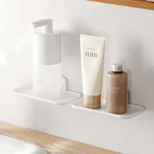 Wall-mounted folding storage shelf, punch-free bathroom organizer for phone and small items.
