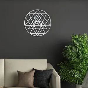 Modern 3D acrylic mirror wall sticker featuring sacred geometric art in a chic living room scene.