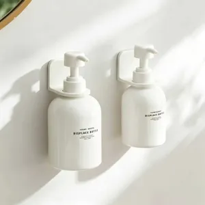 Pratico dispenser di sapone a parete e supporto doccia, elegante mensola in plastica bianca.