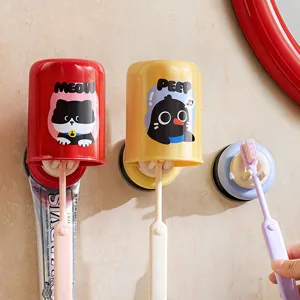 Wall-mounted suction toothbrush holder and mouthwash cup set, punch-free bathroom organizer rack.