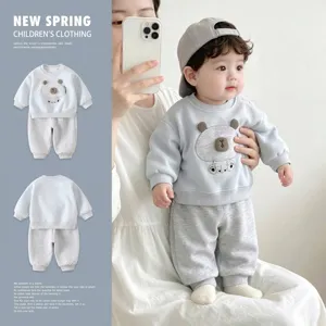 Detailed look of baby boy two-piece bear sweatshirt and sweatpants set for spring outfit