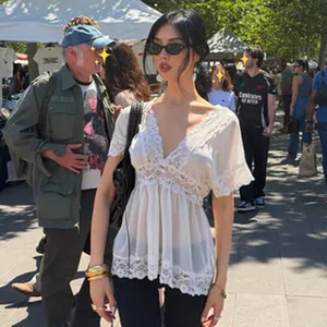 White lace V-neck chiffon mini dress for women in sexy outdoor market lifestyle style