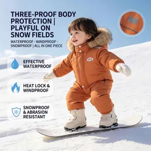 Toddler winter snowsuit in orange with fur hood and waterproof fabric for snow play