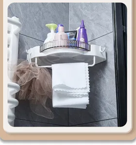 Bathroom rotating corner shelf detail view, wall-mounted plastic organizer for toiletries.