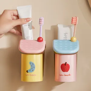 Magnetic wall-mounted toothbrush holder set with cups, dual-color creative bathroom organizer.