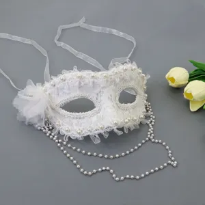 White lace masquerade mask with pearls and ribbons, perfect for parties and ball events.
