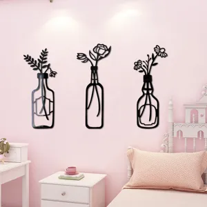 Detailed view of 3d acrylic mirror vase and floral wall stickers in pink bedroom decor.