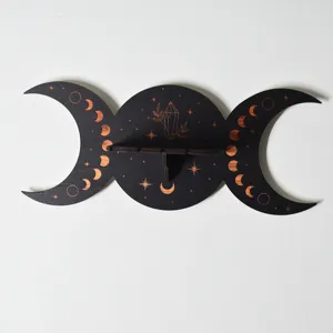 Bohemian triple moon wooden wall shelf with crystal and moon phase engraving for room decor.